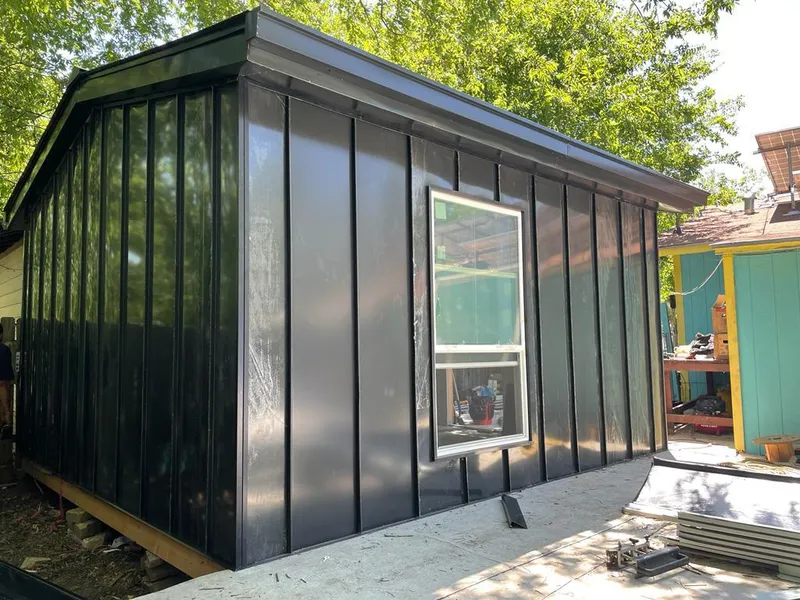 Black standing seam metal wall panels for Metal Roof Installation in Highland Lakes